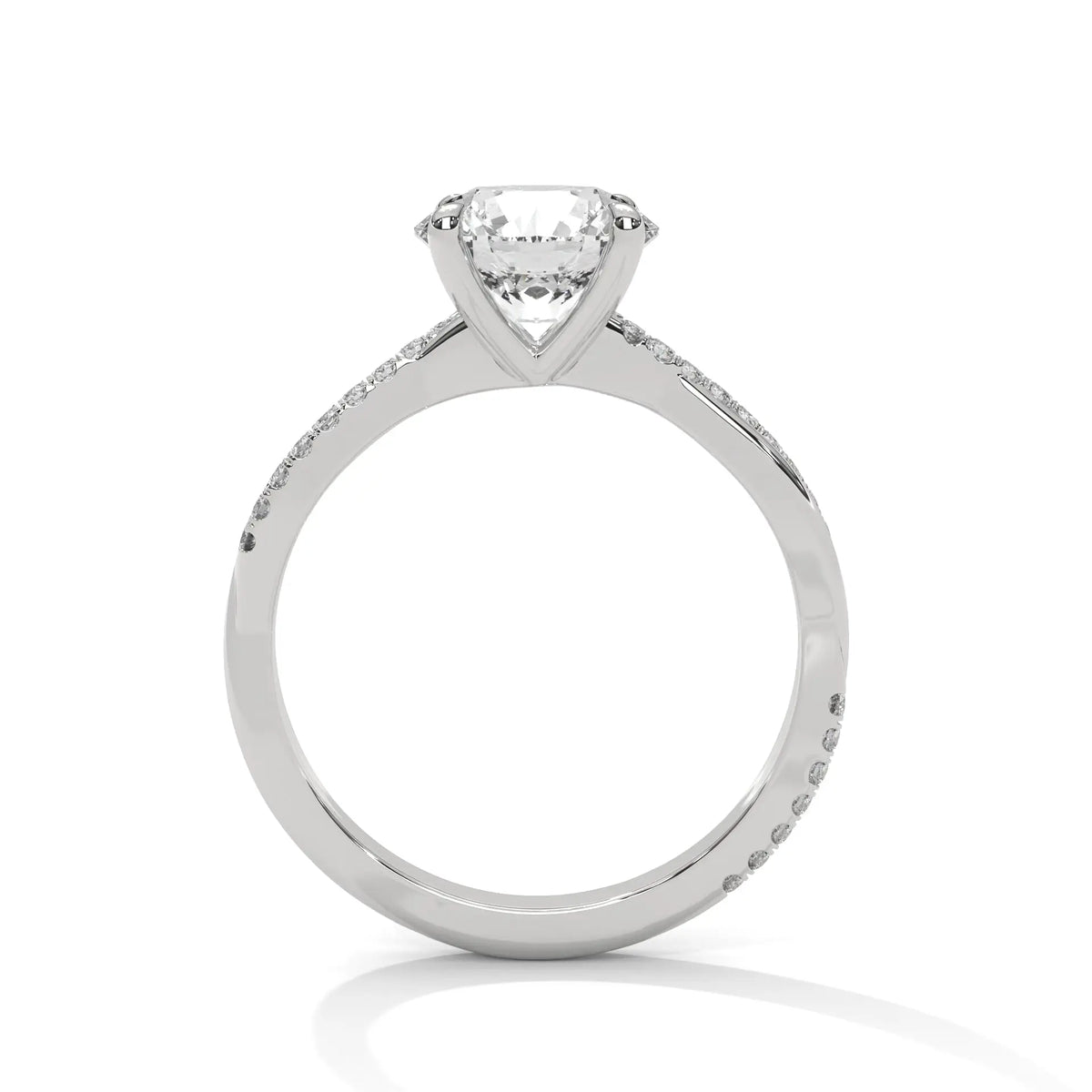 White gold diamond engagement ring with a shield-cut center stone and diamond sides