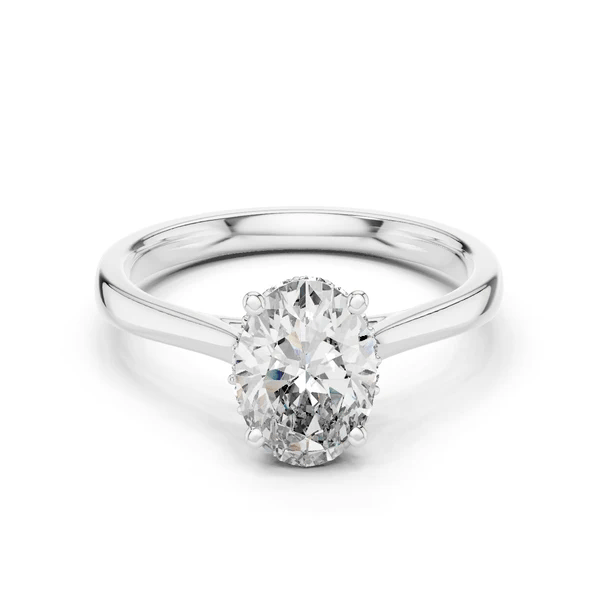 White gold oval diamond ring with center oval stone and hidden halo prongs