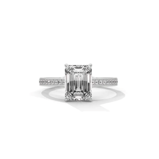 Emerald-cut diamond pavé band ring with white metal setting and side diamond accents