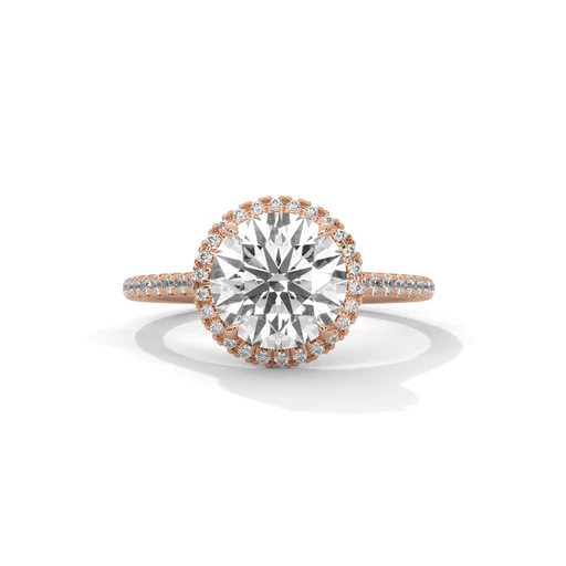 Round halo diamond ring with large round center stone and pavé band, rose gold