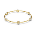 Gold-tone bangle bracelet with crystal pavé links and round central charm