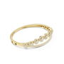 Oval halo bangle ring with pavé edge and raised round centers, yellow gold