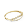 Oval halo bangle ring with pavé edge and raised round centers, yellow gold