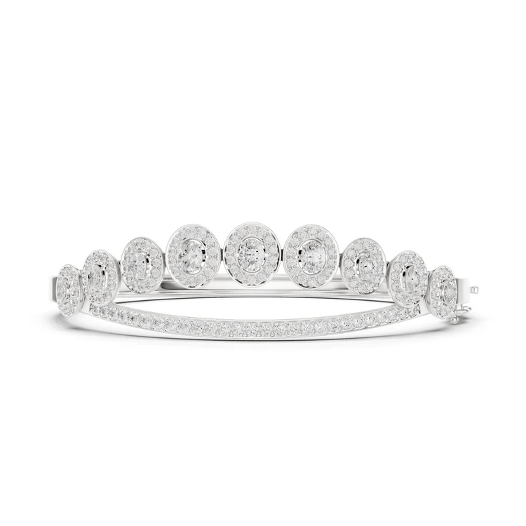 Oval halo bangle ring with raised round center stones and pavé band, white metal