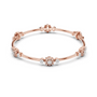 Rose gold diamond bangle bracelet with round stone clusters and a floral center charm.