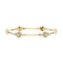 Yellow gold hinged diamond bangle with round clusters and linear bar segments.