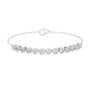 White gold tennis bracelet with round diamonds and heart-shaped clasp