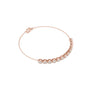 Rose gold tennis bracelet with round diamonds and heart-shaped clasp, profile view