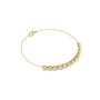 Round diamond tennis bracelet close-up with yellow metal link chain and round stones