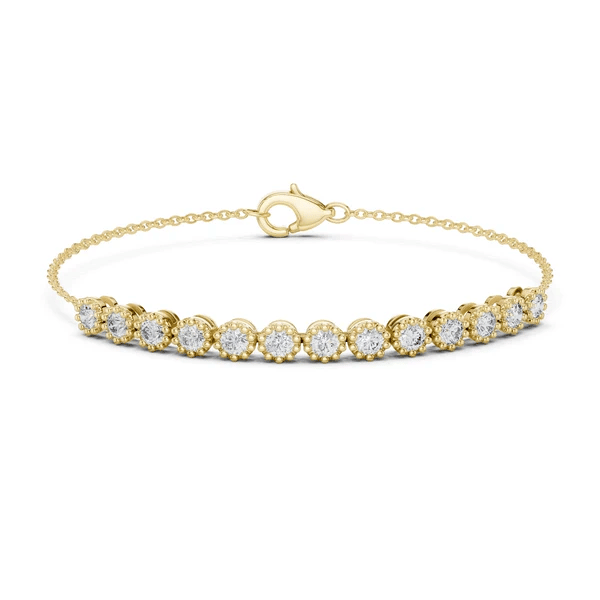Yellow gold tennis bracelet with round diamonds and oval clasp, linked diamond row