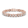 Rose gold cushion-cut diamond tennis bracelet with oval-style links and round diamonds.