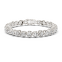 White gold cushion-cut diamond tennis bracelet with oval-style links and round diamonds.