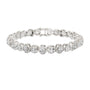 White gold cushion-cut diamond tennis bracelet with oval-style links and round diamonds.