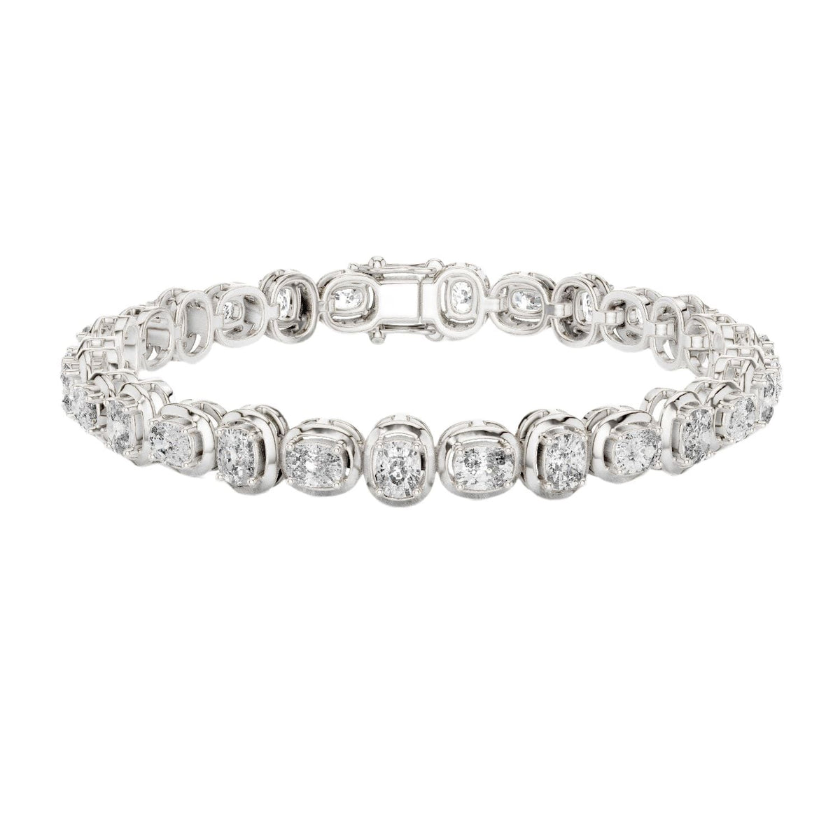 White gold cushion-cut diamond tennis bracelet with oval-style links and round diamonds.