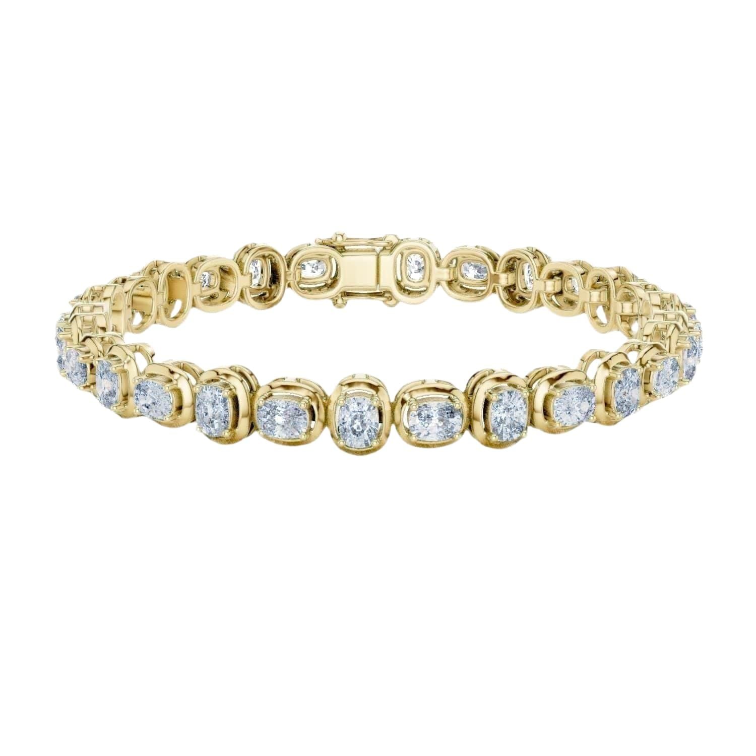 Yellow gold cushion-cut diamond tennis bracelet with oval-style links and round diamonds.