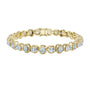 Yellow gold cushion-cut diamond tennis bracelet with oval-style links and round diamonds.