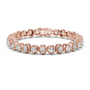 Rose gold tennis bracelet with cushion-cut diamond links and bezel-set stones