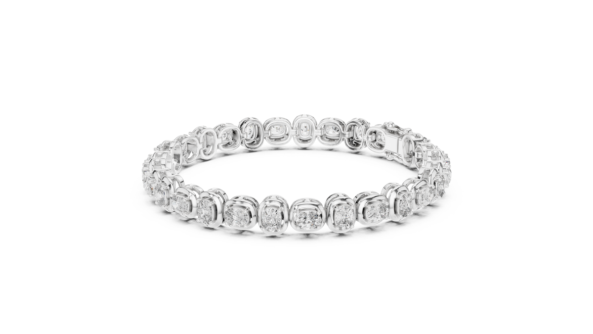 White metal cushion-cut diamond tennis bracelet with a smooth, linked band and sparkle stones