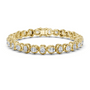 Yellow gold tennis bracelet with cushion-cut diamonds and bright bezel settings