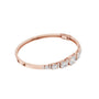 Rose gold diamond bangle with graduated round stones and hinged clasp detail