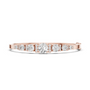 Rose gold graduated diamond bangle with seven round stones
