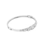 White gold diamond bangle with graduated round stones and hinge clasp detail