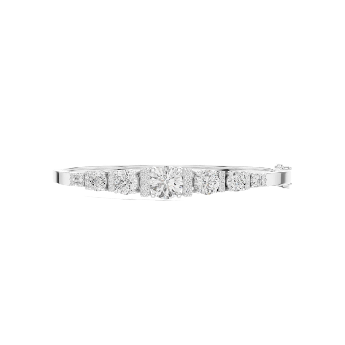 White gold bangle with 7 round diamonds in a graduated row.