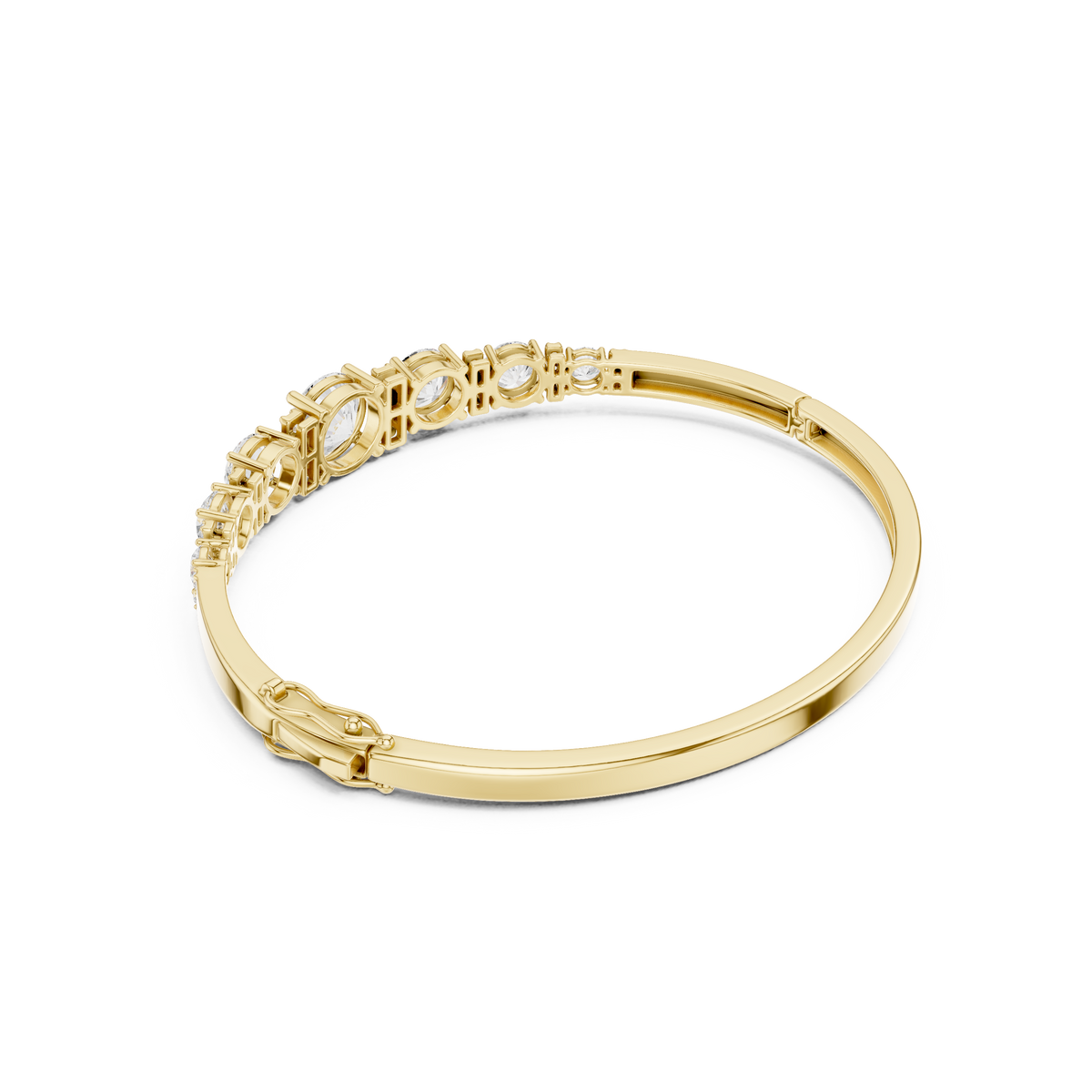 Yellow gold diamond bangle with 7 round graduated stones.