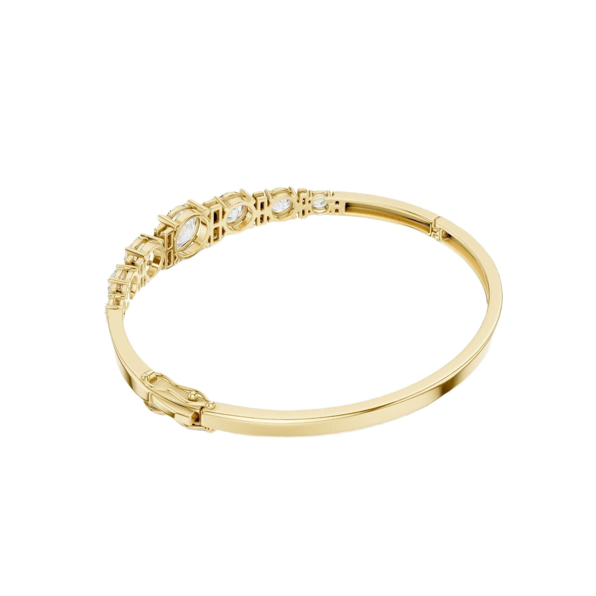 Yellow gold diamond bangle with 7 round graduated stones.