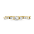Yellow gold graduated diamond bangle with seven round stones, side profile