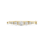 Yellow gold diamond bangle with 7 round graduated stones in a row.