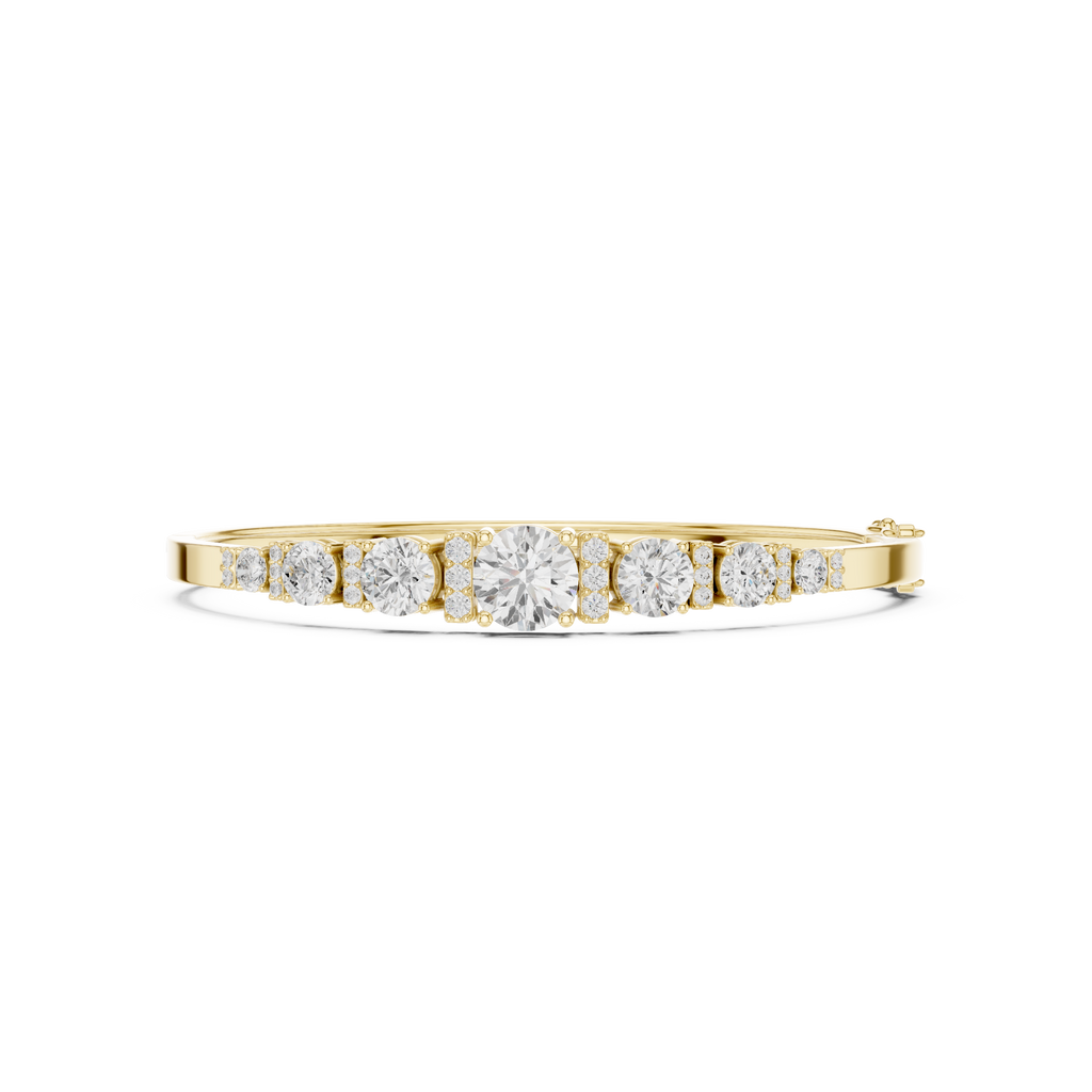 Yellow gold bangle bracelet with seven round graduated diamonds