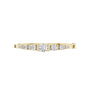 Yellow gold diamond bangle with 7 round graduated stones in a row.