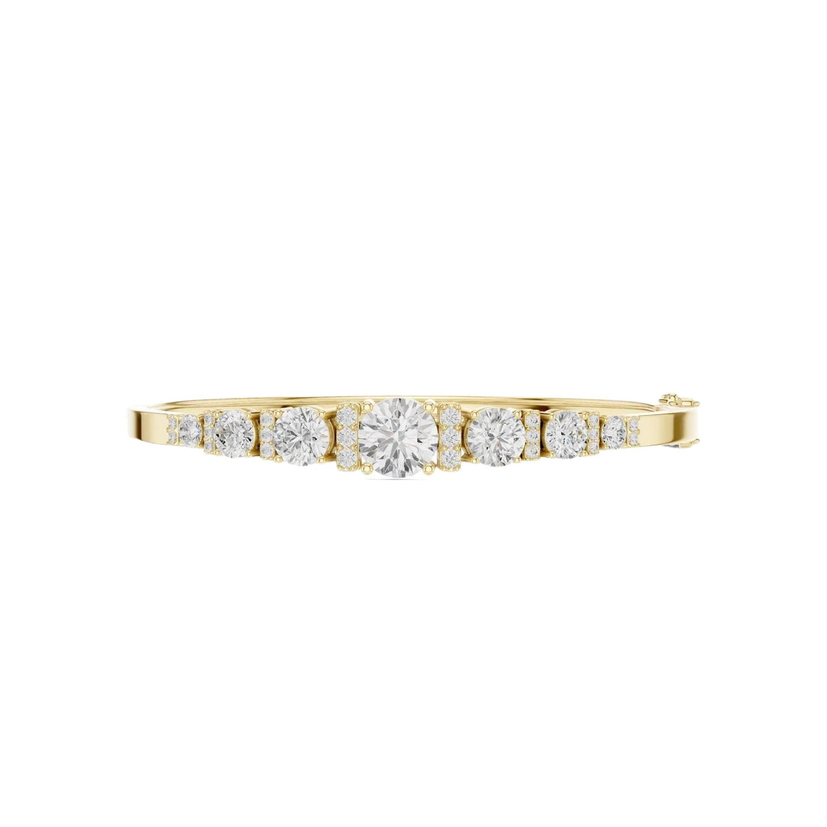 Yellow gold diamond bangle with 7 round graduated stones in a row.