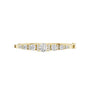 Yellow gold diamond bangle with 7 round graduated stones in a row.