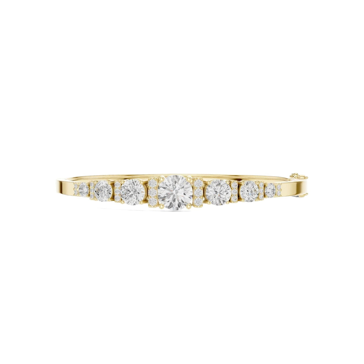 Yellow gold diamond bangle with 7 round graduated stones in a row.