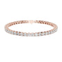 Two-row diamond tennis bracelet in rose gold with round stones and center box clasp.