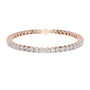 Two-row diamond tennis bracelet in rose gold with round stones and center box clasp.