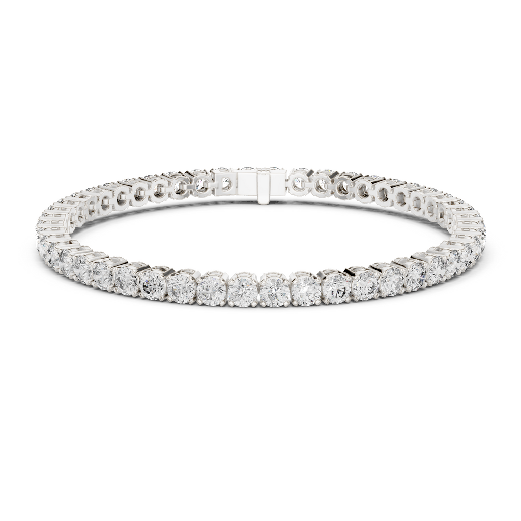 Two-row diamond tennis bracelet in white gold with round stones and center box clasp.