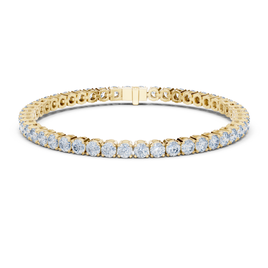 Two-row diamond tennis bracelet in yellow gold with round stones and center box clasp.
