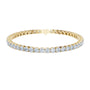 Two-row diamond tennis bracelet in yellow gold with round stones and center box clasp.