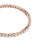 Two-row diamond tennis bracelet in rose gold with round stones, edge view.