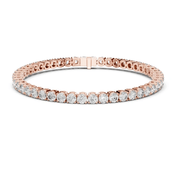 Diamond tennis bracelet in rose gold with round pavé diamonds and hinged center clasp