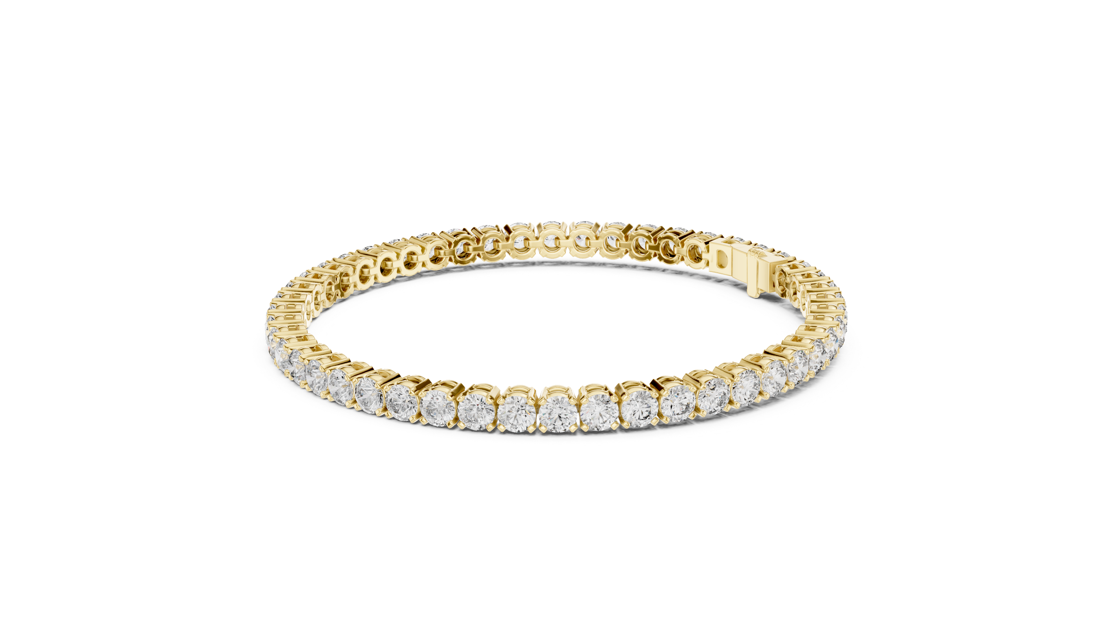 Diamond tennis bracelet in yellow gold with round pavé stones and centered clasp
