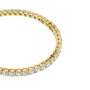 Diamond tennis bracelet with round diamonds, yellow gold metal, oval side profile