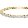 Diamond tennis bracelet with round diamonds, yellow gold metal, side angle view