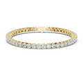 Diamond tennis bracelet in yellow gold with round pavé diamonds and hinged center clasp