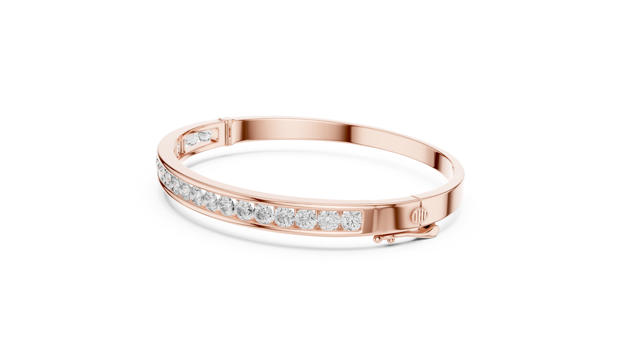 Rose gold channel-set diamond bangle, side view with inner pave detail.