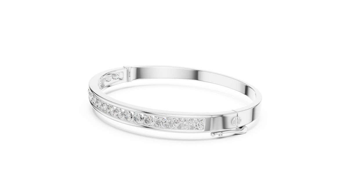 White gold channel-set diamond bangle with round stones, side view.