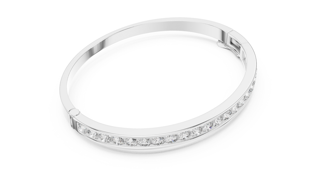 White gold diamond bangle with round channel-set stones, angled view.